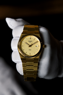 Reloj Tissot PRX 40mm Cuarzo Dorado T137.410.33.021.00