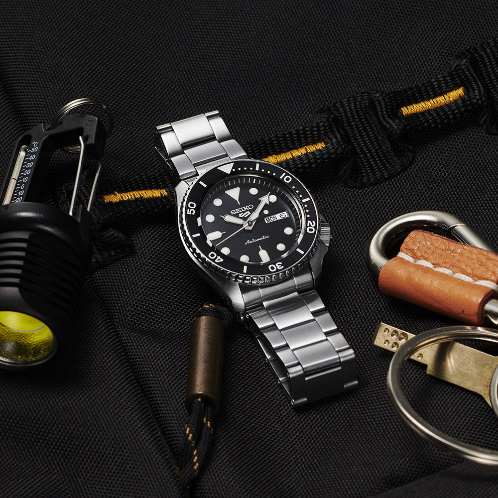 Reloj Seiko 5 Sports SRPD55K1 — Automático Negro Acero 100m