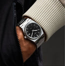 Reloj Tissot PRX T137.410.11.051.00 — Cuarzo Suizo 40mm Esfera Negra Acero