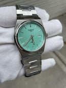 Reloj Tissot PRX T137.410.11.091.01 — Cuarzo Suizo 40mm Esfera Verde Acero