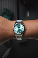 Reloj Kosmo 645-7-2009 Colección Zafiro Plateado Esfera Turquesa