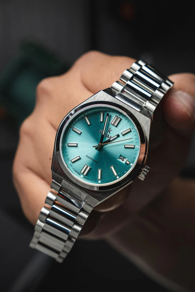 Reloj Kosmo 645-7-2009 Colección Zafiro Plateado Esfera Turquesa