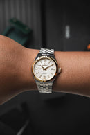 Reloj Kosmo 645-7-2010 Colección Zafiro Bicolor Dorado Esfera Blanca
